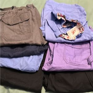 Seven pairs of Kathy Patterson, and healing hands scrubs pants small